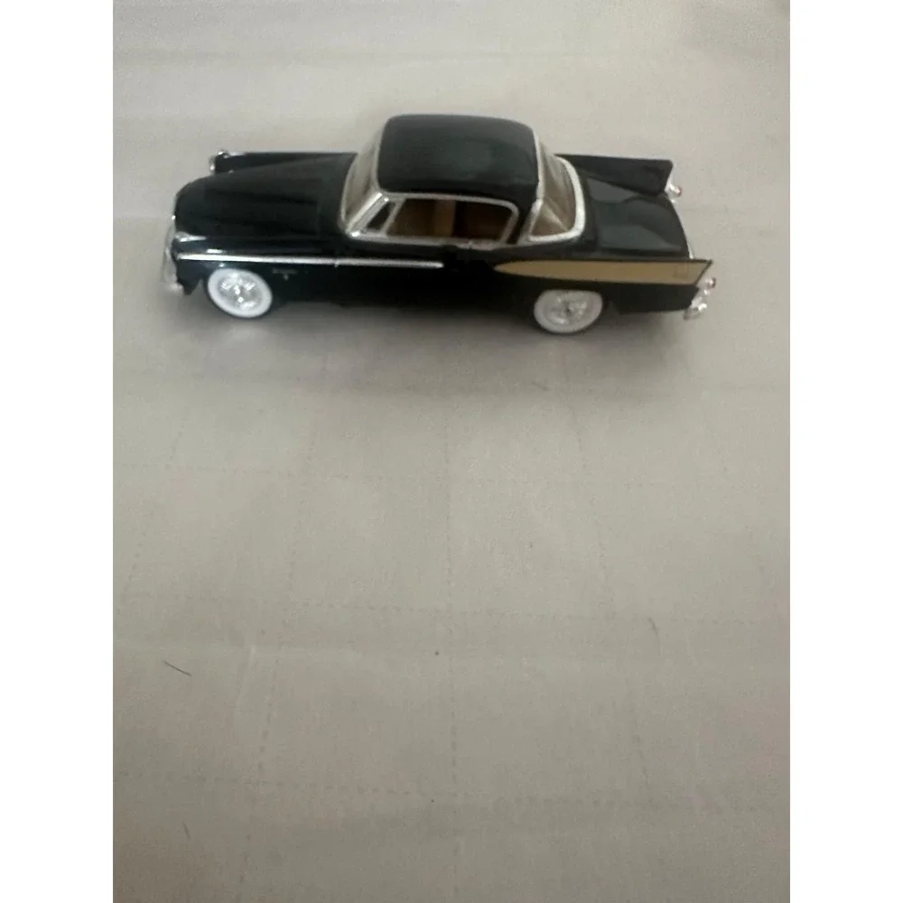 Toy Metal Die Cast 1958 Studebaker Golden Hawk Road Signature Car Black Gold
